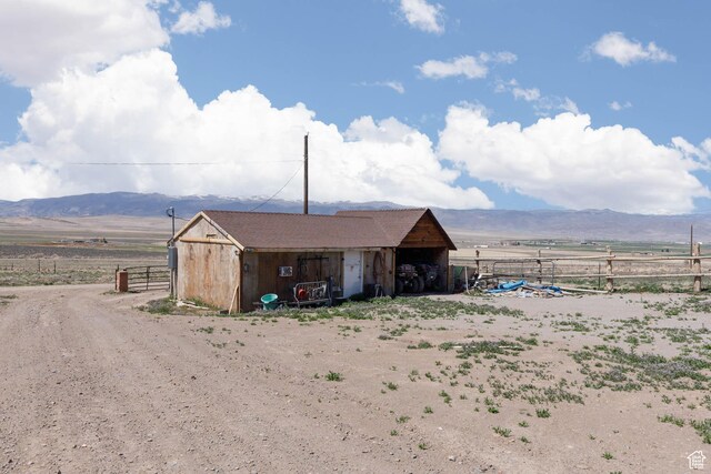 3001 S 600 W, Monroe, UT 84754 - view of outdoor structure featuring an outdoor structure, fence, a rural view, and a mountain view