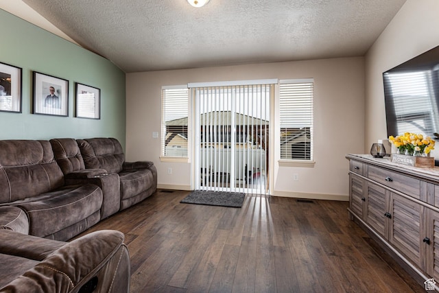 6576 W Oak Bridge Dr, West Jordan, UT 84081 - living room with dark wood-style flooring, baseboards, and a textured ceiling