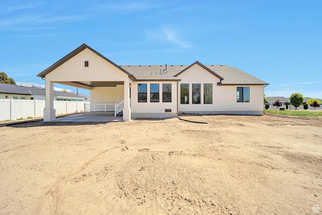 1910 W Bonneville Ln, Kaysville, UT 84037 - back of house featuring fence, roof with shingles, and stucco siding