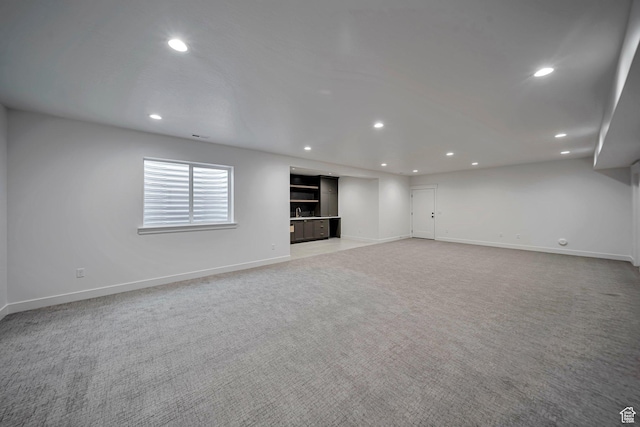 1910 W Bonneville Ln, Kaysville, UT 84037 - basement featuring baseboards, recessed lighting, and light carpet