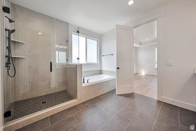 1910 W Bonneville Ln, Kaysville, UT 84037 - full bathroom with tile patterned floors, recessed lighting, a stall shower, and a bath