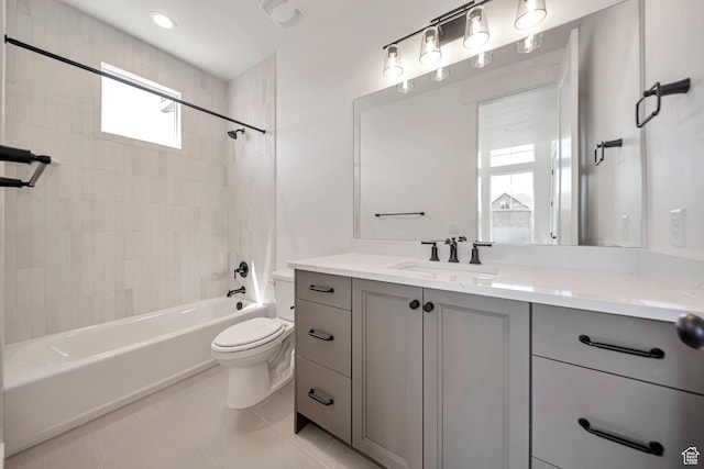1910 W Bonneville Ln, Kaysville, UT 84037 - bathroom with washtub / shower combination, toilet, tile patterned flooring, and vanity