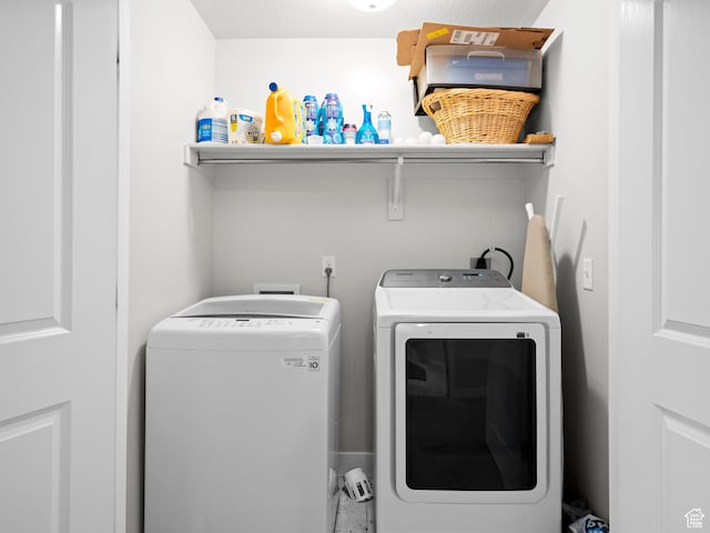 laundry room with washer and dryer