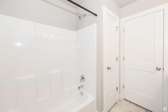2276 W 2625 S Unit 110, West Haven, UT 84401 - full bath with marble finish floor and washtub / shower combination