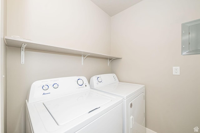 2276 W 2625 S Unit 110, West Haven, UT 84401 - laundry area featuring washing machine and dryer, electric panel, and laundry area