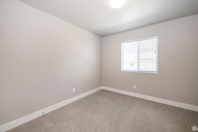 2276 W 2625 S Unit 110, West Haven, UT 84401 - empty room with baseboards and carpet