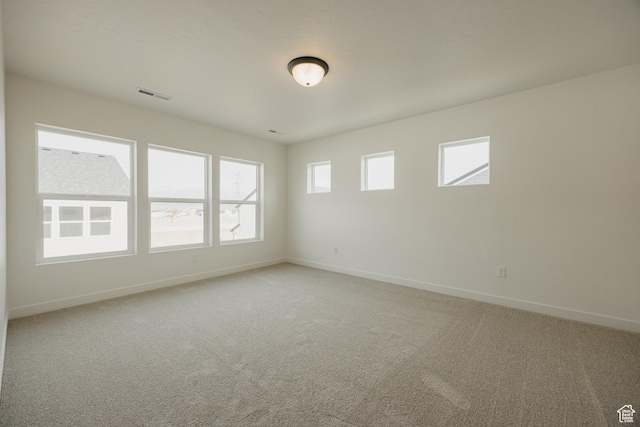 3651 N Oak Blvd Unit 337, Eagle Mountain, UT 84005 - empty room with visible vents, light carpet, and baseboards