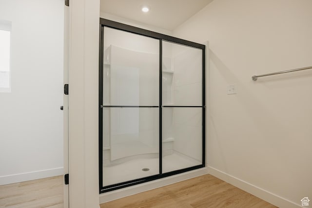 3651 N Oak Blvd Unit 337, Eagle Mountain, UT 84005 - bathroom featuring recessed lighting, a shower stall, wood finished floors, and baseboards