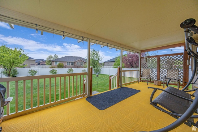 sunroom with a residential view