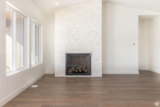 496 E Kayak Dr Unit 306, Hideout, UT 84036 - unfurnished living room with recessed lighting, vaulted ceiling, wood finished floors, baseboards, and a fireplace
