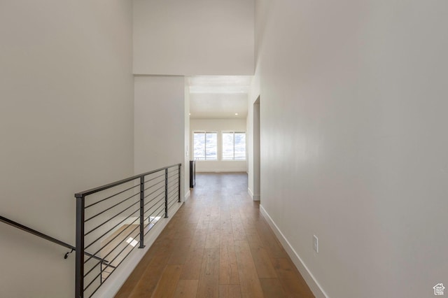 496 E Kayak Dr Unit 306, Hideout, UT 84036 - corridor with hardwood / wood-style flooring, baseboards, and an upstairs landing