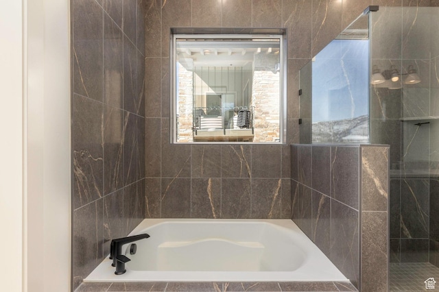 496 E Kayak Dr Unit 306, Hideout, UT 84036 - bathroom featuring a garden tub and tiled shower