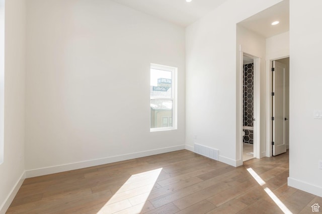 496 E Kayak Dr Unit 306, Hideout, UT 84036 - empty room with baseboards, light wood-style flooring, visible vents, and recessed lighting