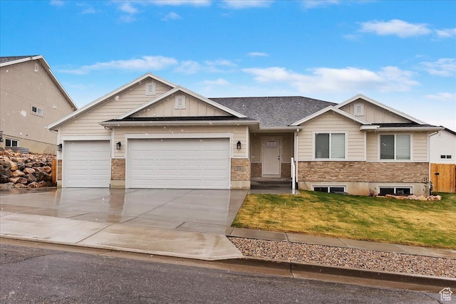 816 E Clover Way, Morgan, UT 84050 - view of front of home featuring board and batten siding, an attached garage, a front lawn, and concrete driveway