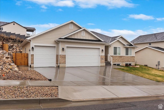 816 E Clover Way, Morgan, UT 84050 - craftsman-style house featuring an attached garage, driveway, and board and batten siding