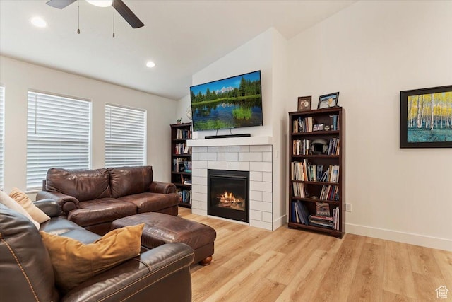 816 E Clover Way, Morgan, UT 84050 - living room featuring a fireplace, lofted ceiling, a ceiling fan, wood finished floors, and recessed lighting