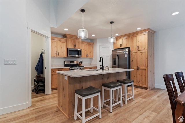816 E Clover Way, Morgan, UT 84050 - kitchen featuring appliances with stainless steel finishes, a sink, light countertops, and recessed lighting