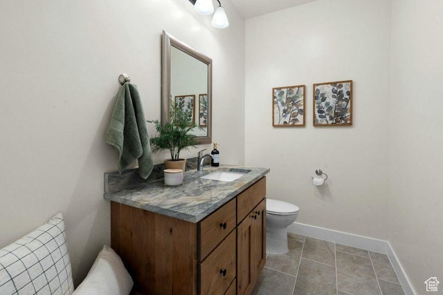 48 N Meadow Dr, Pine Valley, UT 84781 - bathroom with baseboards, vanity, and toilet