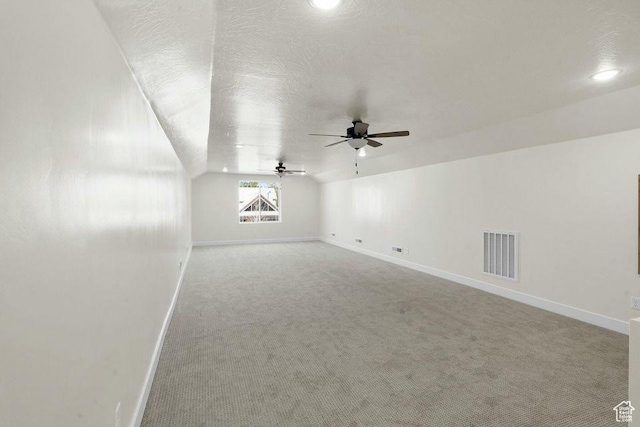 48 N Meadow Dr, Pine Valley, UT 84781 - additional living space featuring lofted ceiling, visible vents, baseboards, and carpet