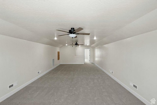 48 N Meadow Dr, Pine Valley, UT 84781 - additional living space with lofted ceiling, carpet flooring, a ceiling fan, and visible vents