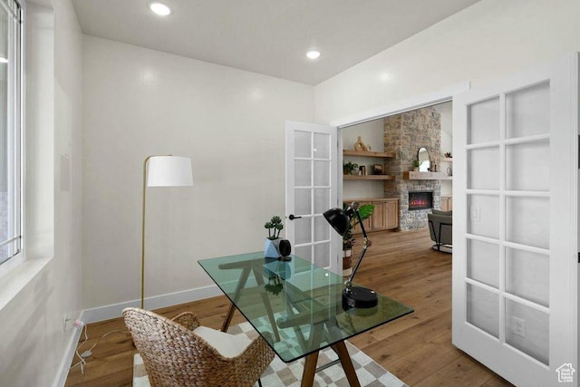 48 N Meadow Dr, Pine Valley, UT 84781 - home office with a fireplace, wood finished floors, baseboards, and french doors
