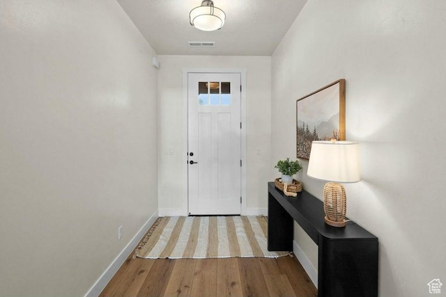 48 N Meadow Dr, Pine Valley, UT 84781 - entryway featuring baseboards, wood finished floors, and visible vents