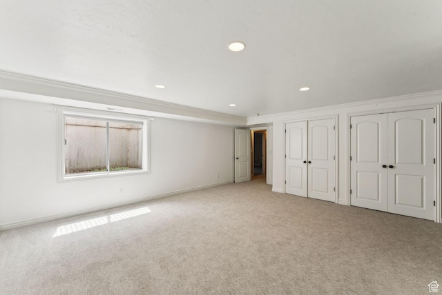 6391 S Shenandoah Park Ave E, Salt Lake City, UT 84121 - unfurnished bedroom featuring crown molding, two closets, carpet floors, baseboards, and recessed lighting