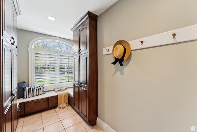 6391 S Shenandoah Park Ave E, Salt Lake City, UT 84121 - interior space featuring recessed lighting, baseboards, and light tile patterned floors
