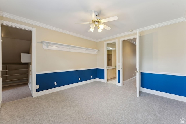6391 S Shenandoah Park Ave E, Salt Lake City, UT 84121 - unfurnished room featuring carpet, crown molding, baseboards, and ceiling fan