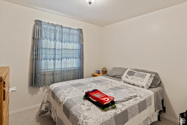 6241 S Barton Park Dr, West Jordan, UT 84081 - carpeted bedroom featuring baseboards