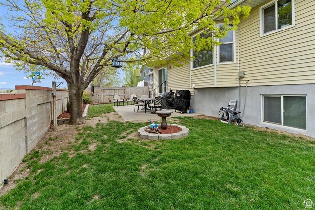 6241 S Barton Park Dr, West Jordan, UT 84081 - view of yard featuring a fenced backyard and a patio area
