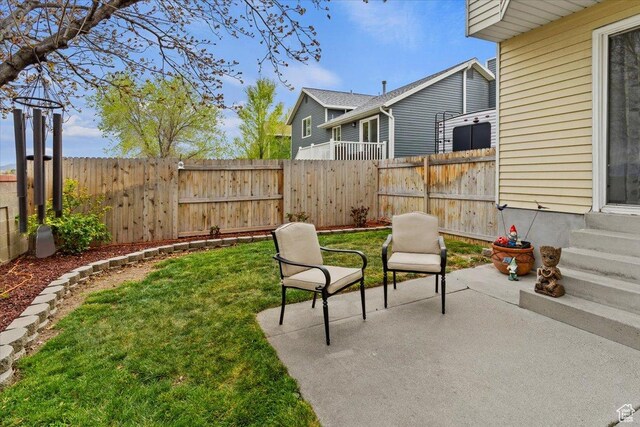 6241 S Barton Park Dr, West Jordan, UT 84081 - view of yard featuring a patio area and a fenced backyard
