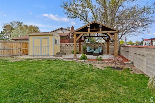6241 S Barton Park Dr, West Jordan, UT 84081 - view of yard featuring a gazebo, a storage unit, a patio area, and a fenced backyard