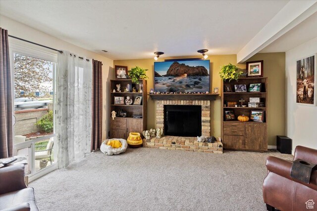 6241 S Barton Park Dr, West Jordan, UT 84081 - carpeted living room with a brick fireplace and a healthy amount of sunlight