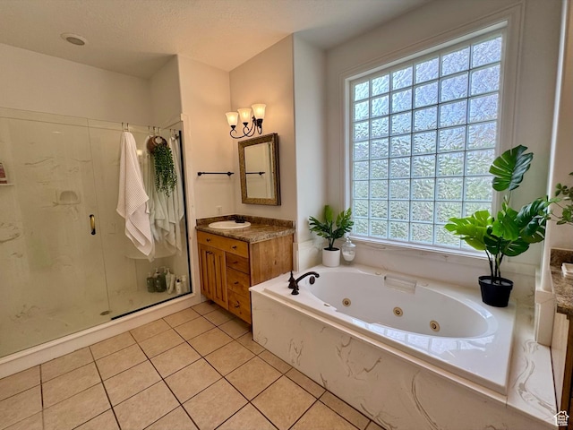 1844 W Heritage Ranch Dr N, Farr West, UT 84404 - bathroom featuring a tub with jets, vanity, a wealth of natural light, and a stall shower