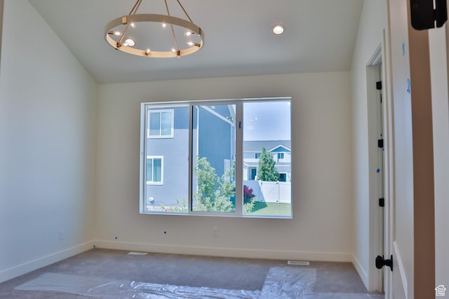 61 N 2430 W Unit 6, Lehi, UT 84043 - empty room with carpet flooring, a chandelier, baseboards, and vaulted ceiling