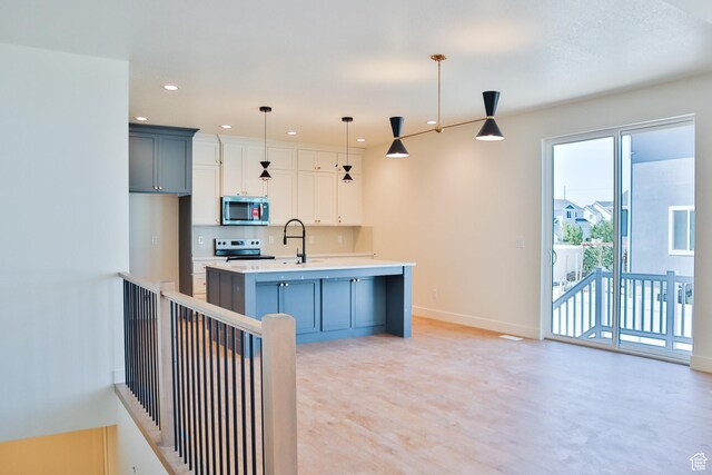 61 N 2430 W Unit 6, Lehi, UT 84043 - kitchen featuring stainless steel microwave, light countertops, range with electric stovetop, baseboards, and recessed lighting