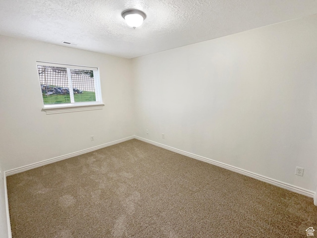 112 E Ama Fille Ln, Payson, UT 84651 - empty room with baseboards, carpet flooring, a textured ceiling, and visible vents