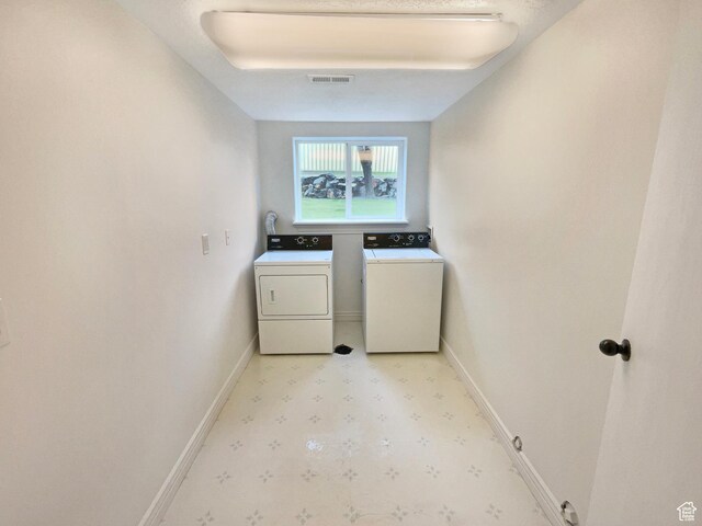112 E Ama Fille Ln, Payson, UT 84651 - washroom with light floors, laundry area, washing machine and dryer, baseboards, and visible vents