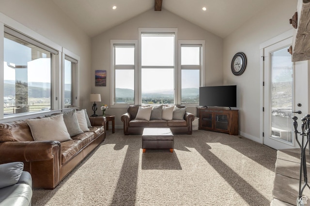 living room with plenty of natural light, light carpet, baseboards, and recessed lighting
