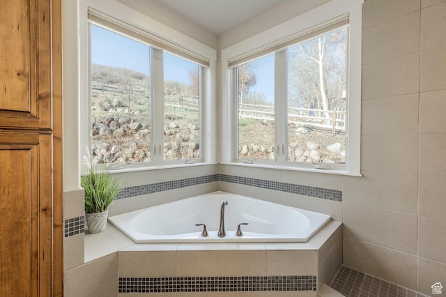 full bathroom featuring a garden tub
