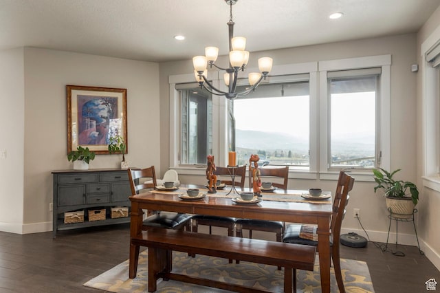 dining room featuring wood finished floors, a chandelier, baseboards, and recessed lighting