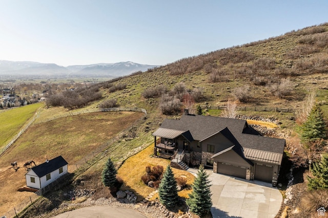overview of rural landscape with a mountain backdrop