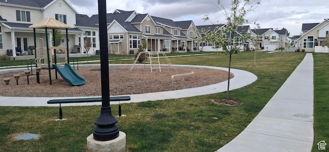 4502 S Stonington Way, Taylorsville, UT 84129 - view of home's community with a yard, playground community, and a residential view