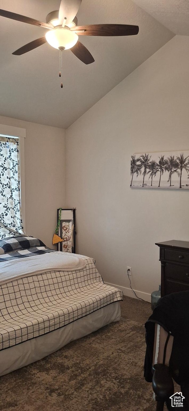 4502 S Stonington Way, Taylorsville, UT 84129 - bedroom with lofted ceiling, a ceiling fan, baseboards, and dark carpet