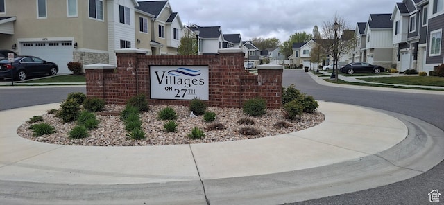 4502 S Stonington Way, Taylorsville, UT 84129 - community / neighborhood sign featuring an attached garage and a residential view