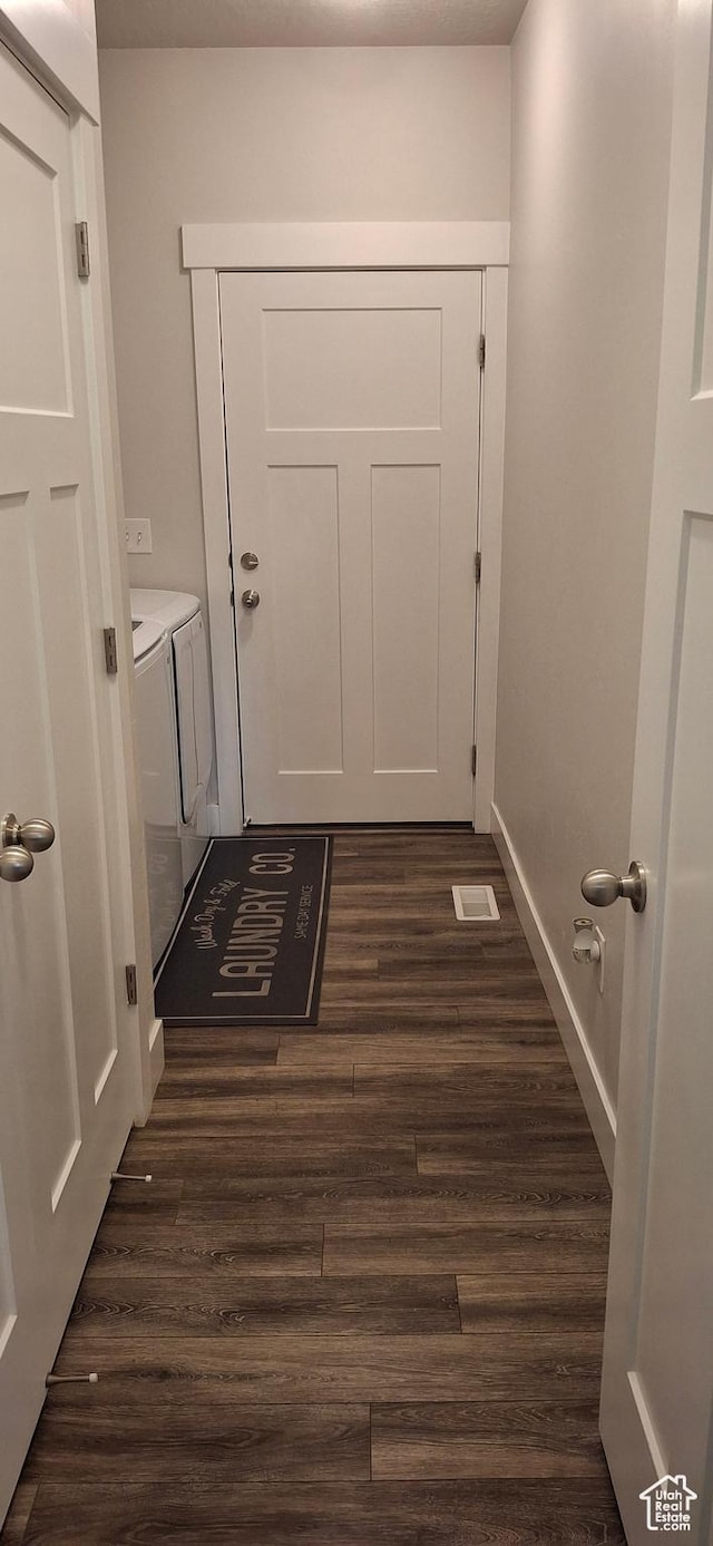 4502 S Stonington Way, Taylorsville, UT 84129 - entryway with washing machine and clothes dryer, baseboards, and dark wood-style flooring