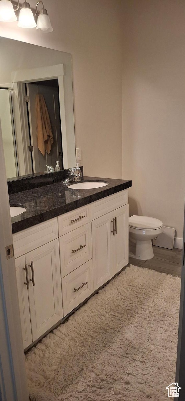 4502 S Stonington Way, Taylorsville, UT 84129 - full bath featuring toilet, a sink, and double vanity