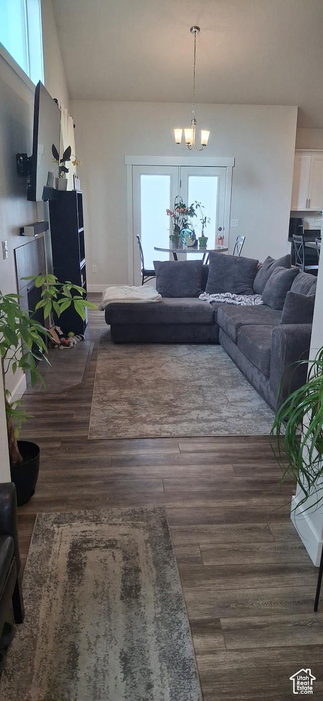 4502 S Stonington Way, Taylorsville, UT 84129 - living room with an inviting chandelier and dark wood-type flooring