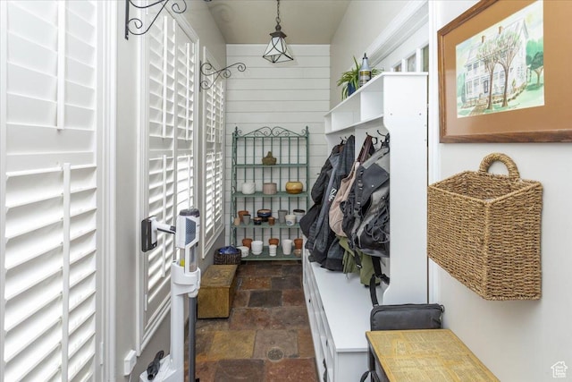 mudroom featuring stone finish flooring
